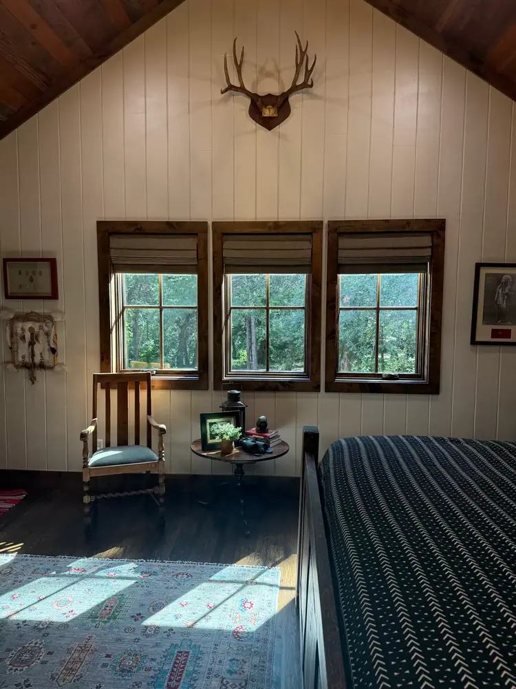 Shutters installed in a lodge-style living room