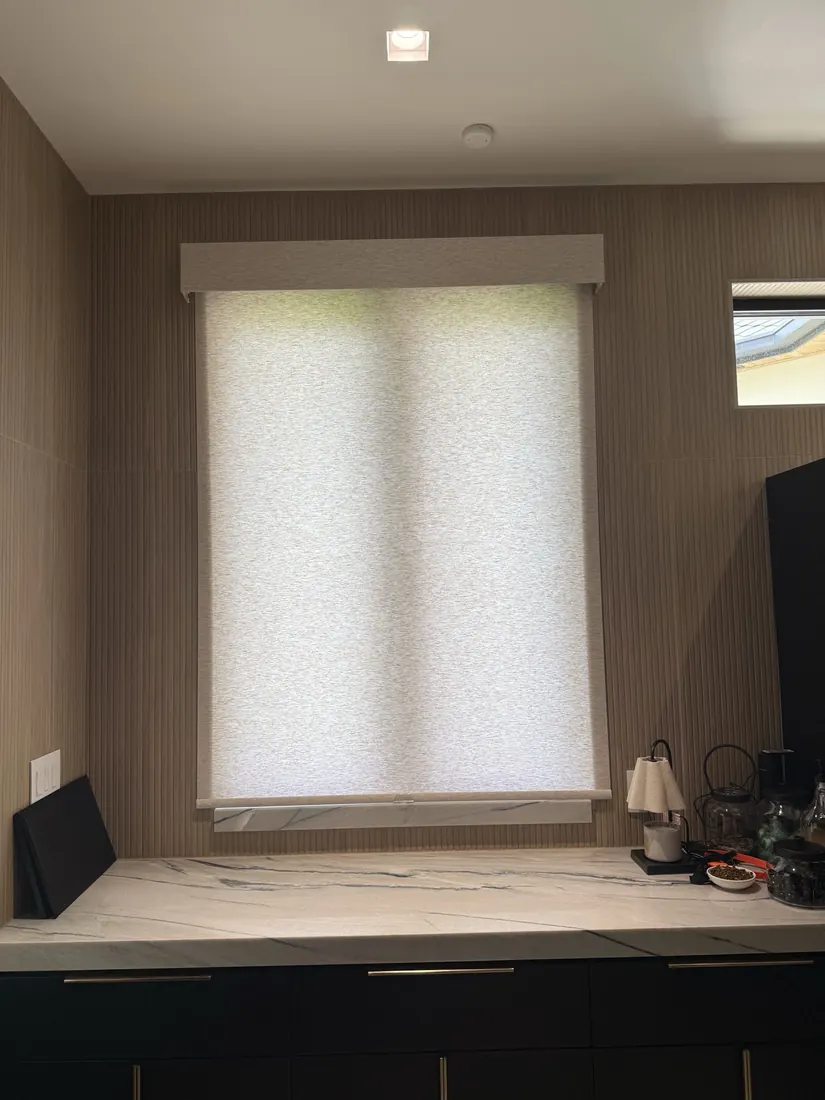 Shade over a built-in desk