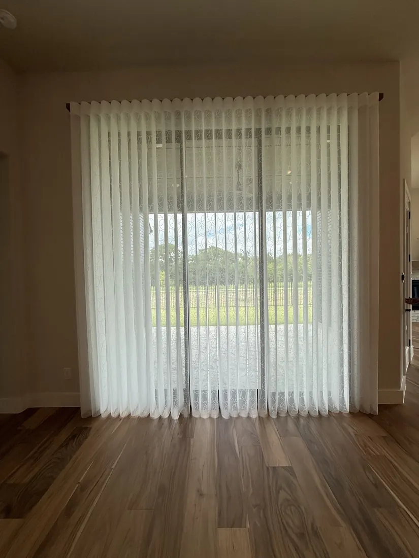 Sheer shades on a sliding door